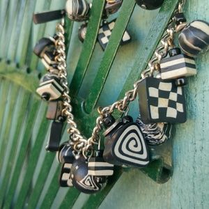 Retro silver chain bracelets and pin from the 80's